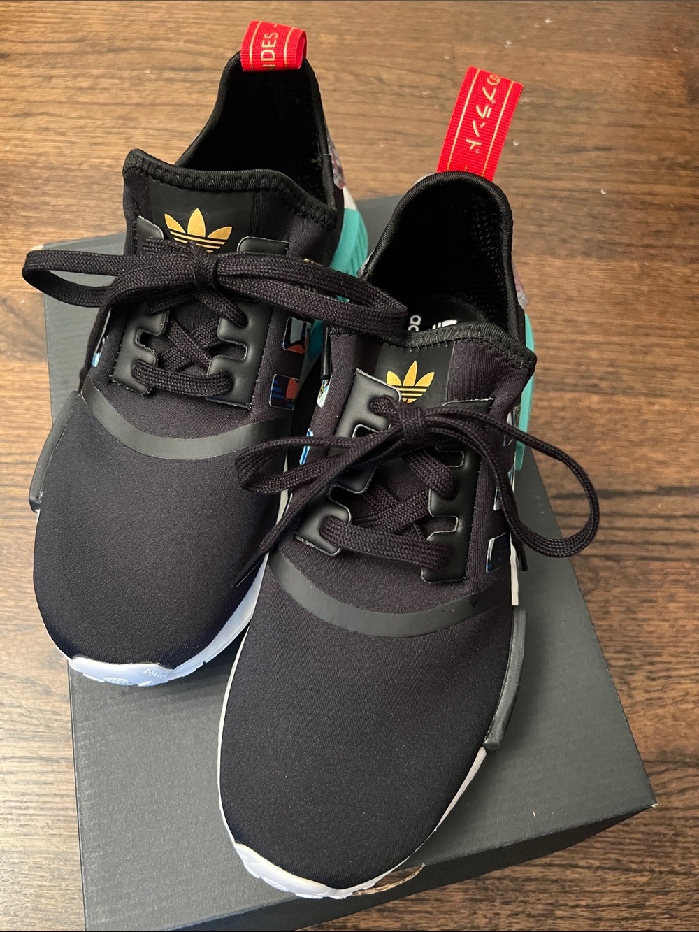 adidas Women’s Black Sneakers with Teal Accents